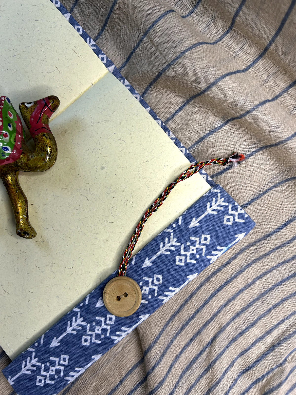 Iklil Wrap-Closure Journal – Slate Arrows